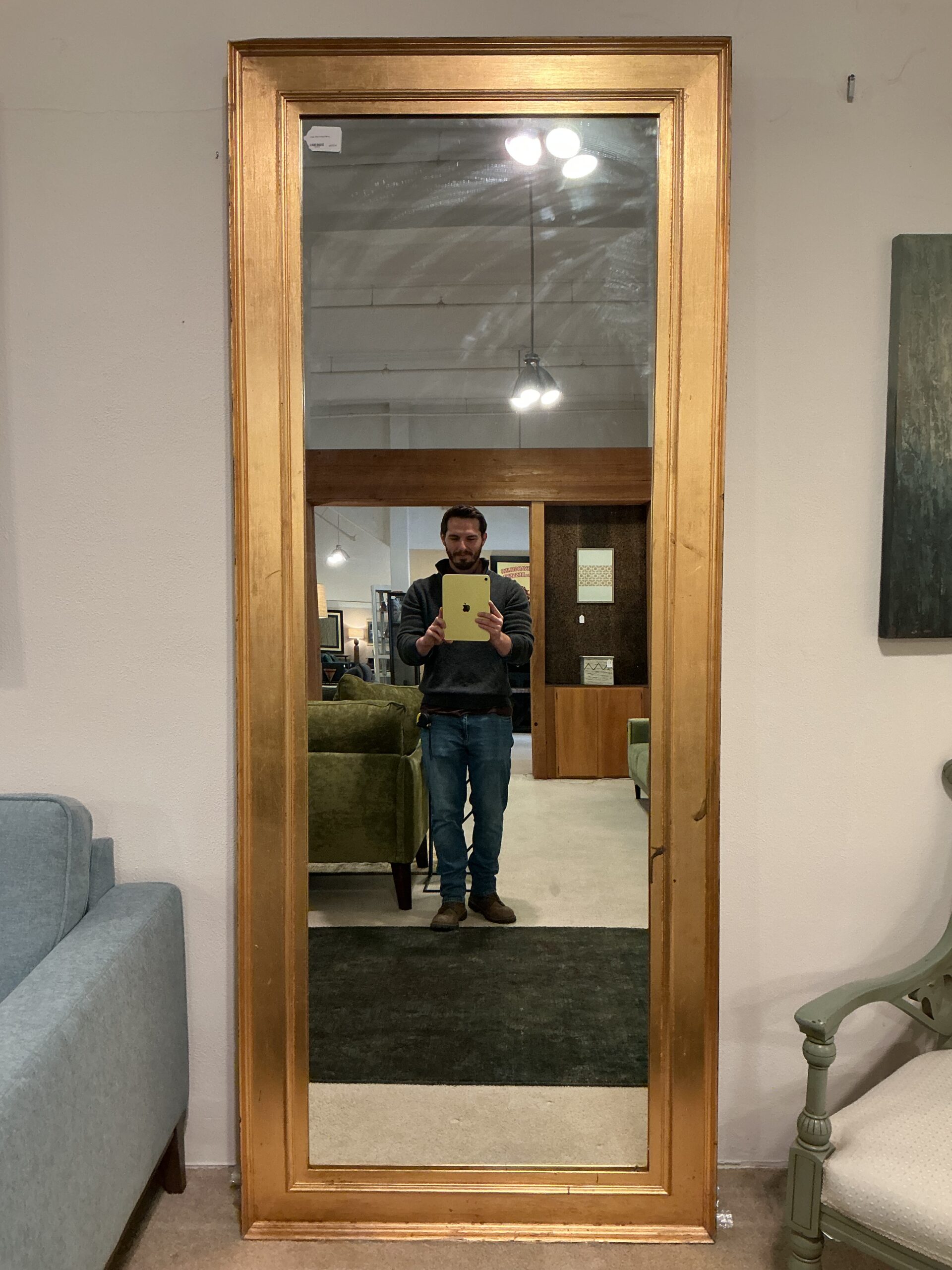 large gold framed mirror