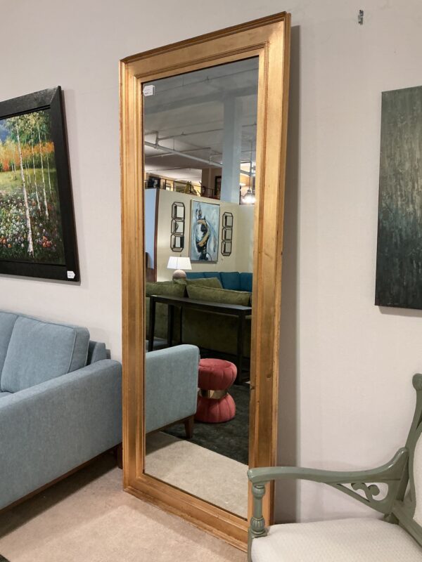 large gold framed mirror