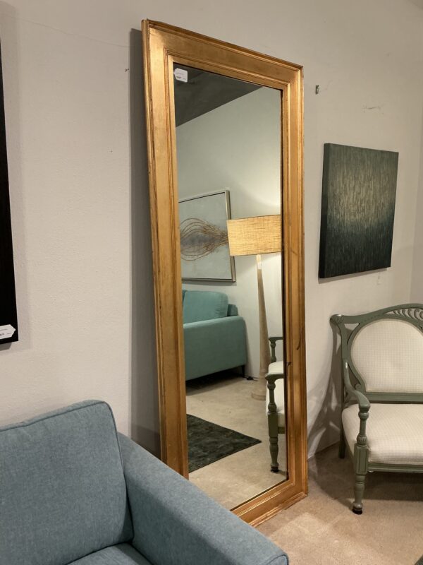 large gold framed mirror