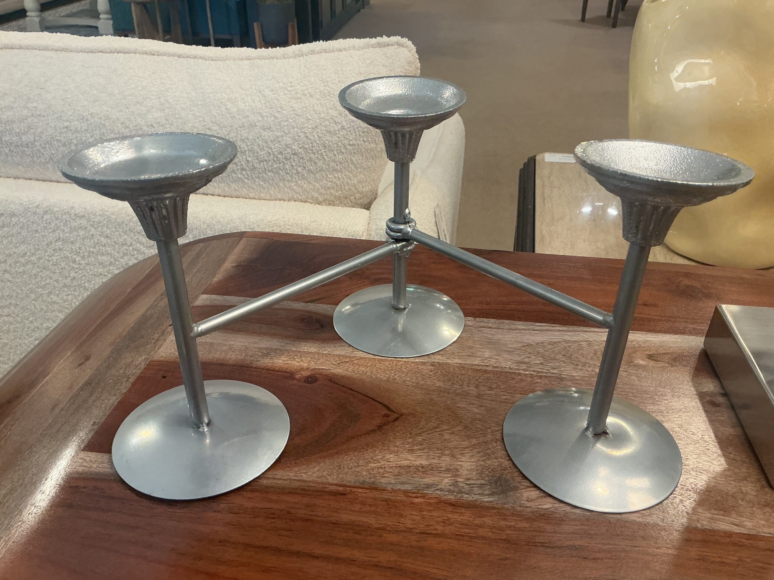 three candle stick holder