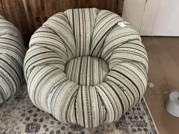 pumpkin and black swivel chair
