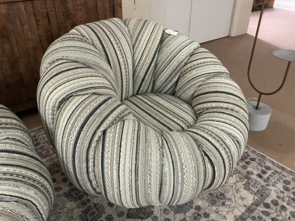pumpkin and black swivel chair