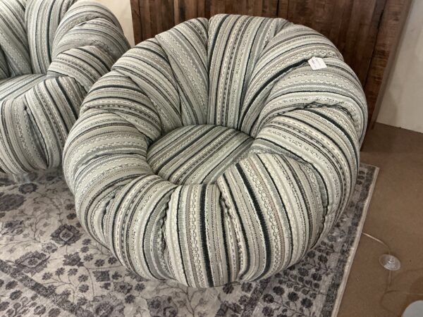 pumpkin and black swivel chair