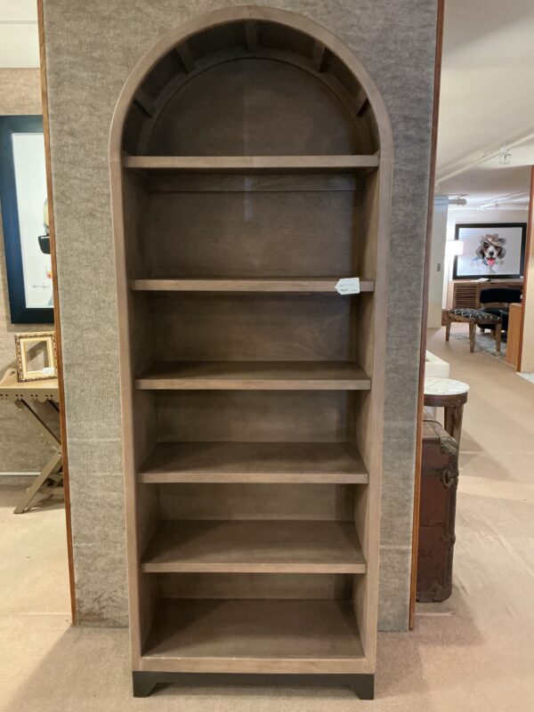 tall wooden arch bookcase