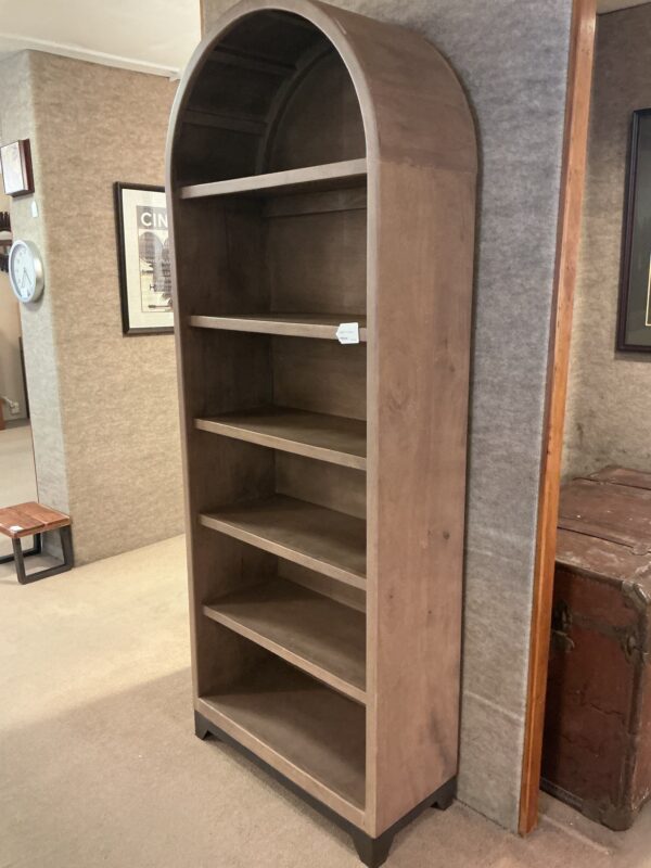 tall wooden arch bookcase