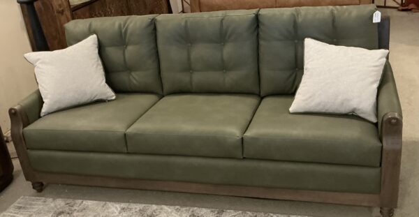 olive green wooden framed sofa