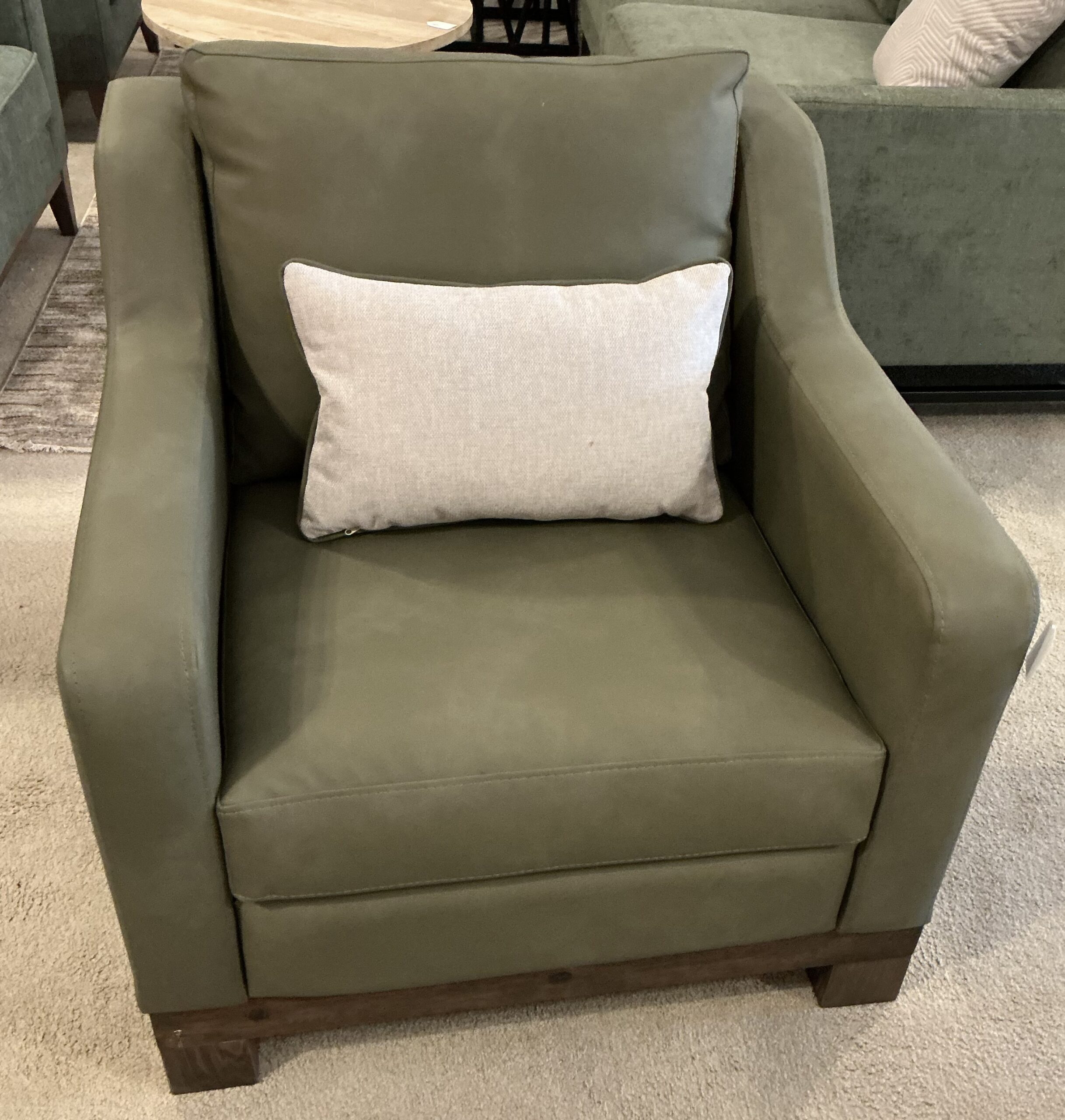 olive green wooden framed armchair
