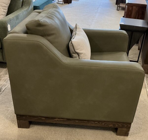 olive green wooden framed armchair