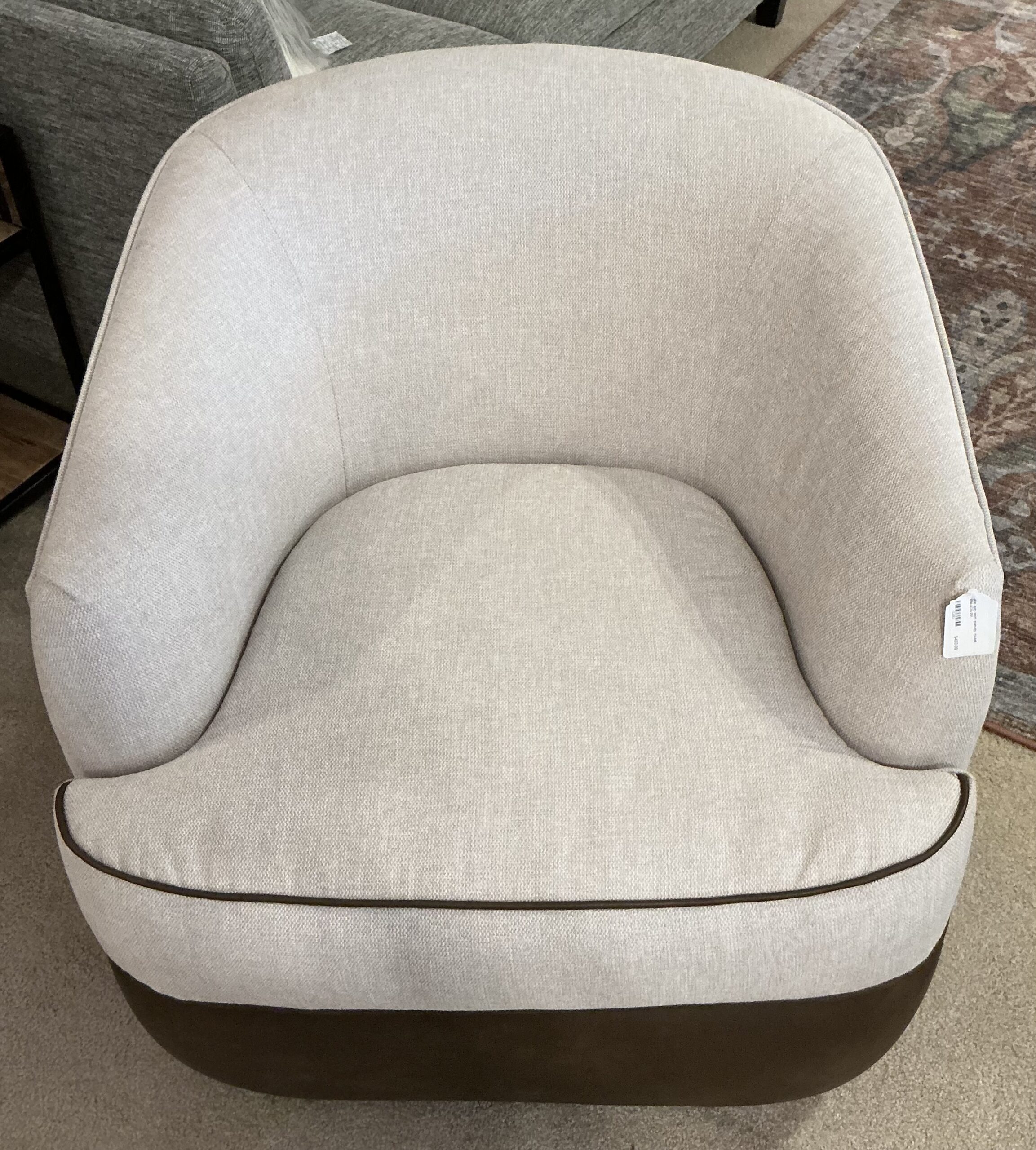 brown and sand swivel chair