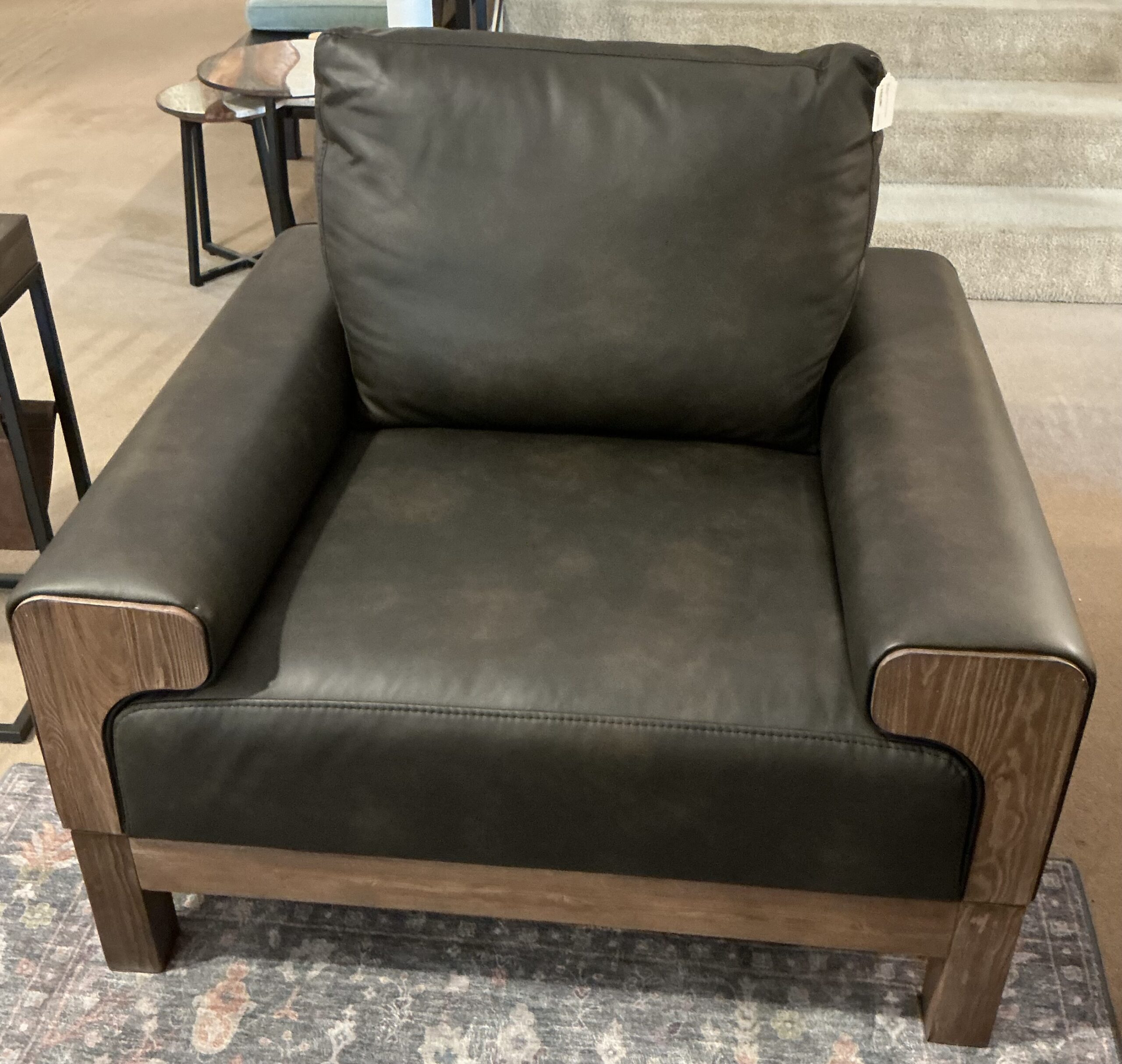 black wooden framed armchair
