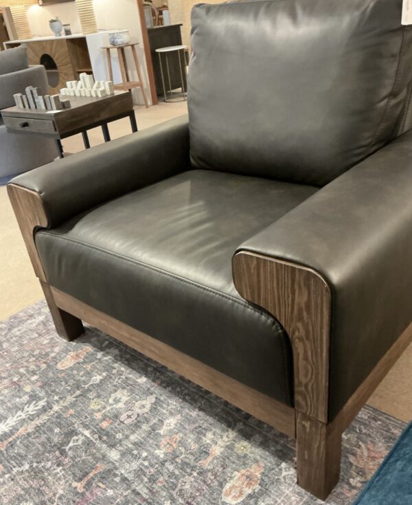 black wooden framed armchair