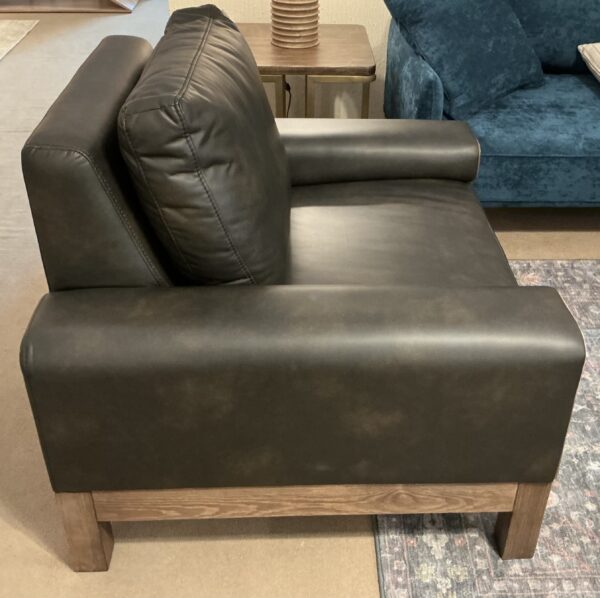 black wooden framed armchair
