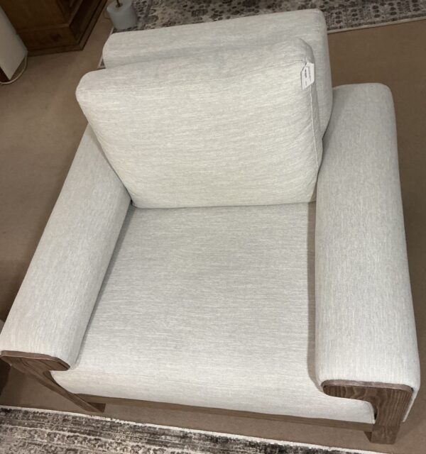 white wooden framed base armchair