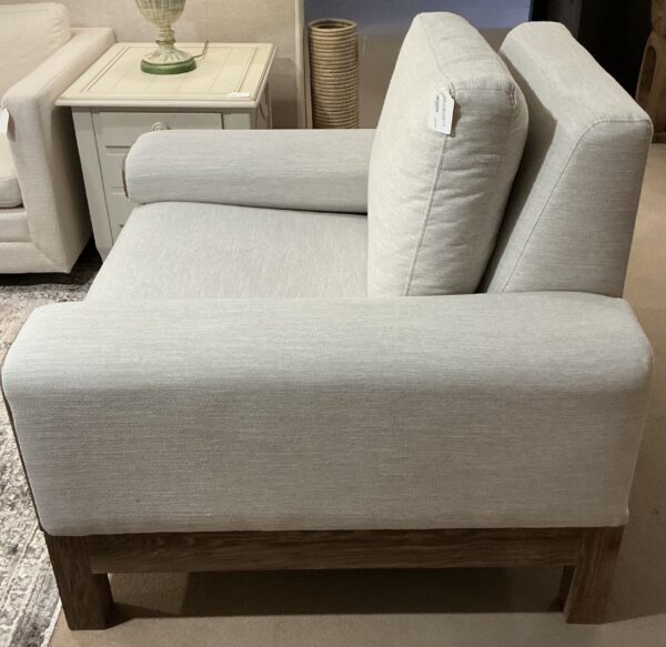white wooden framed base armchair