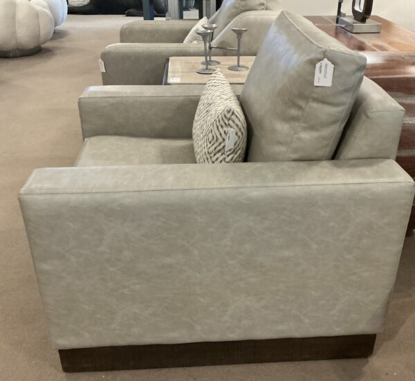 wooden framed silver armchair