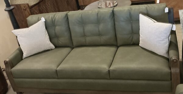 olive green wooden framed sofa