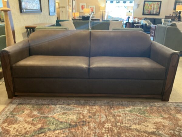 tan wooden framed sofa