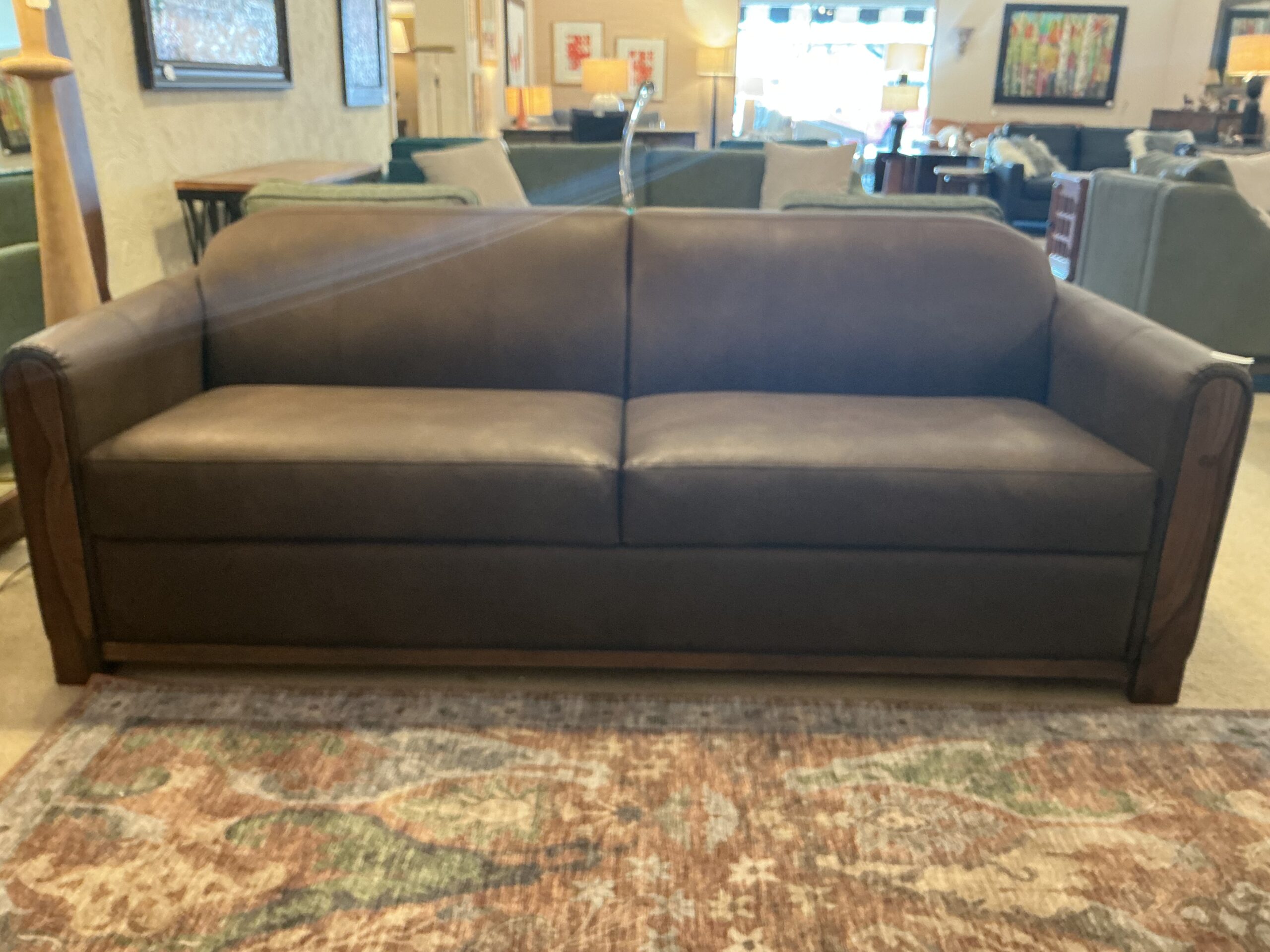 tan wooden framed sofa