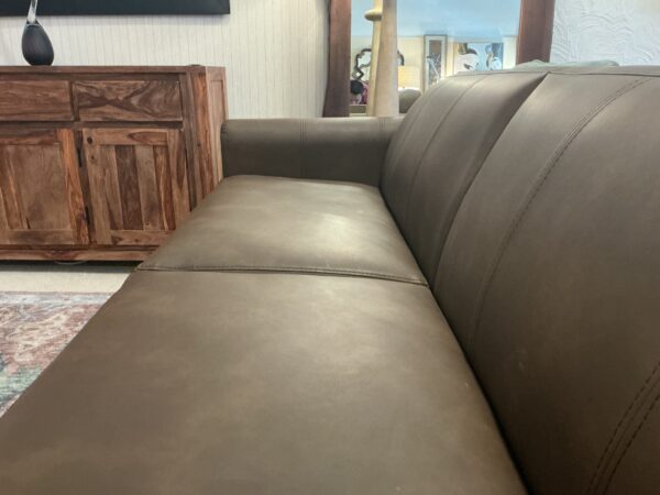 tan wooden framed sofa