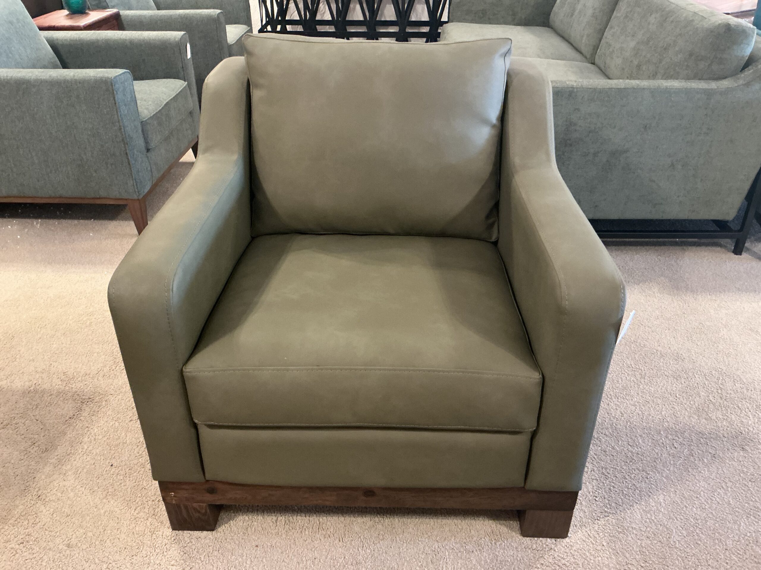 olive green wooden frame armchair