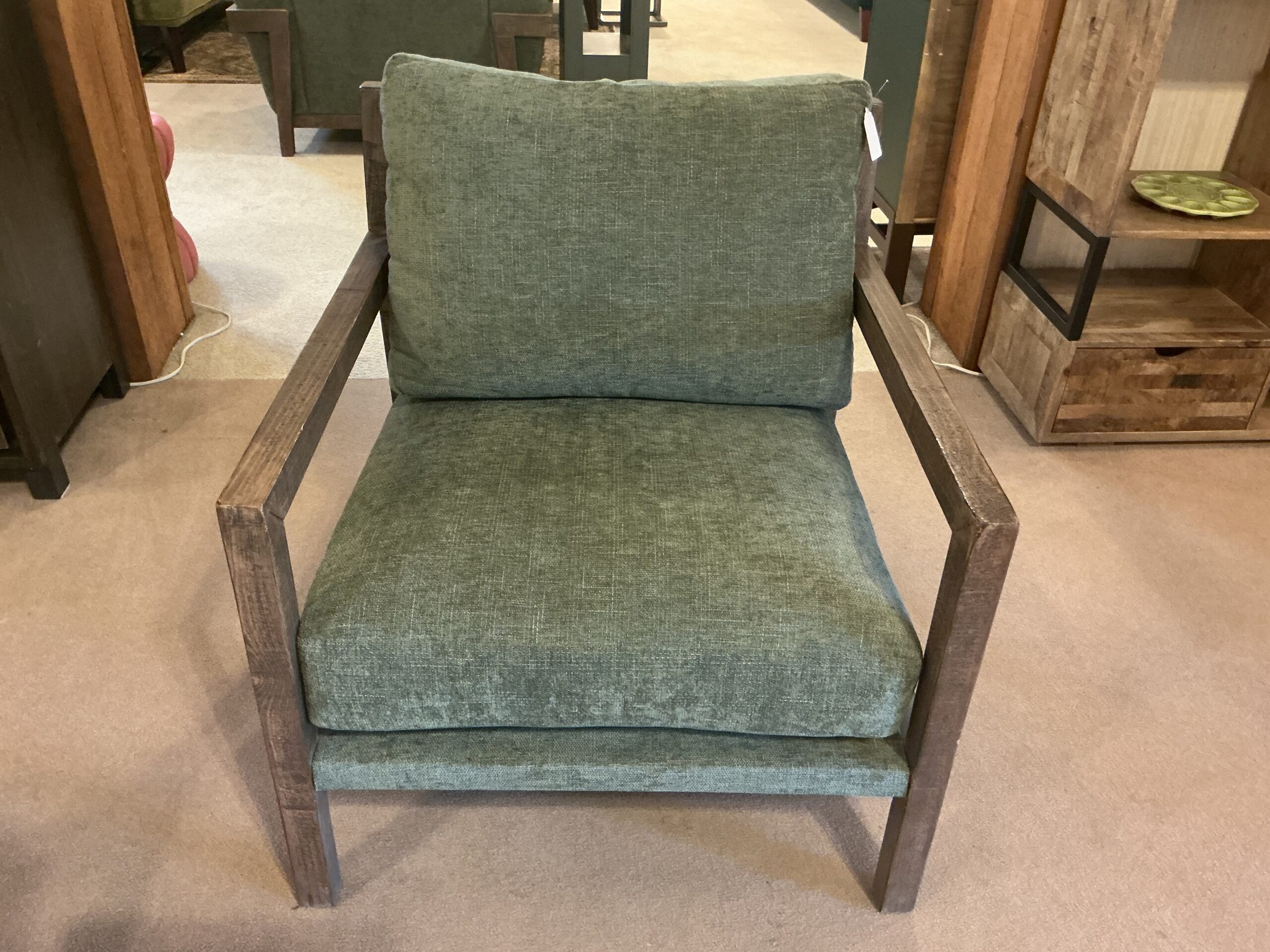 green wooden framed chair