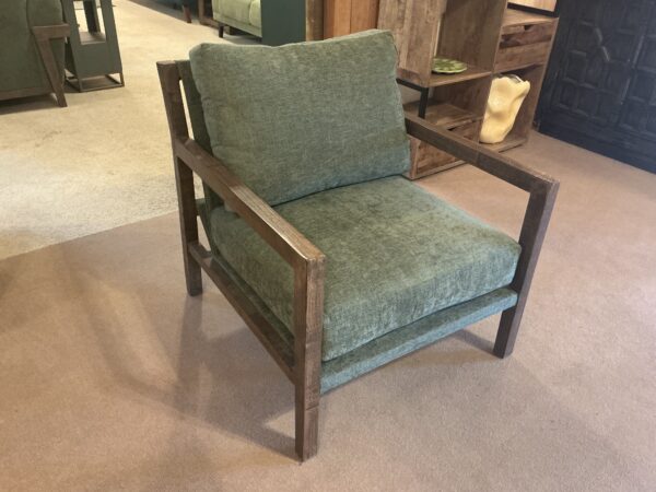 green wooden framed chair